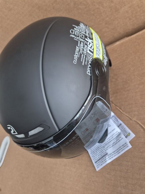 Helmet with visor and ear heated pads